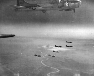 B-17 bombers leave the Moosbierbaum, Austria target area, August 28, 1944.  The city is partially obscured by defensive smokescreens. (Fold3, 2007b)